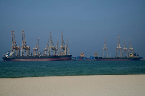Tankers are seen at the Khor Fakkan Container Terminal, the only natural deep-sea port in the region and one of the major container ports in the Sharjah Emirate, along the Strait of Hormuz.