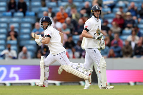 England's Ben Duckett (L) and Zak Crawley run between wickets on day five of the first cricket Test against India at Headingley cricket ground in Leeds, northern England on June 24, 2025.