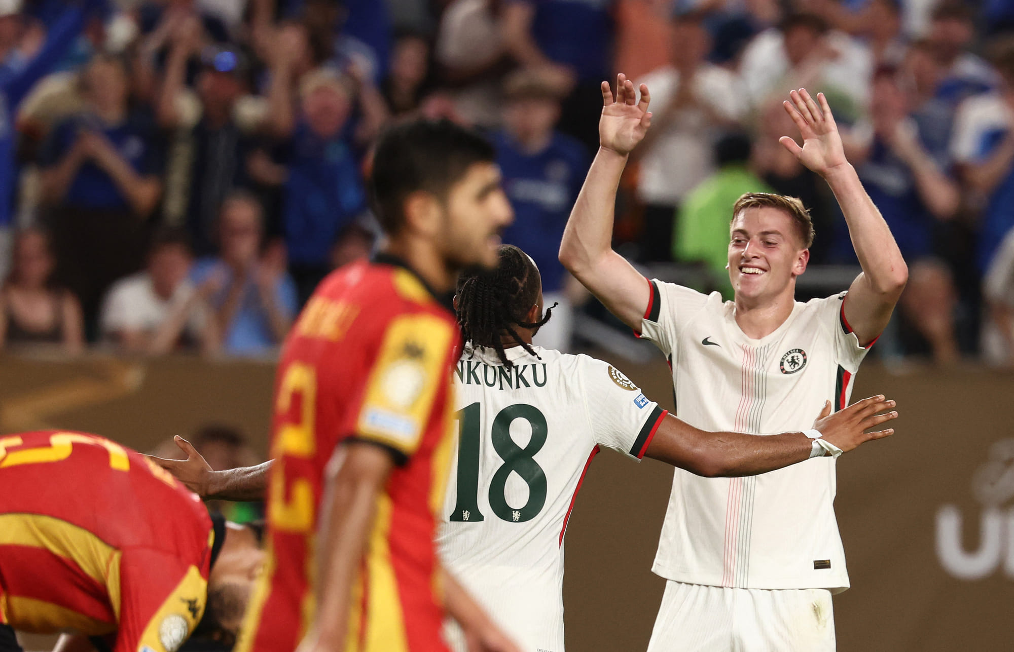 Chelsea's forward Liam Delap (right) celebrates after scoring his team's second goal with teammate French striker Christopher Nkunku during the Fifa Club World Cup 2025 Group D football match against Tunis' Esperance Sportive de Tunis at the Lincoln Financial Field stadium in Philadelphia on June 24, 2025.