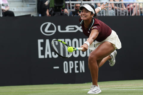Philippines' Alexandra Eala stretches to return to Australia's Maya Joint during their women's singles final tennis match on day six of the Lexus Eastbourne International tennis tournament in Eastbourne, southern England, on June 28, 2025.