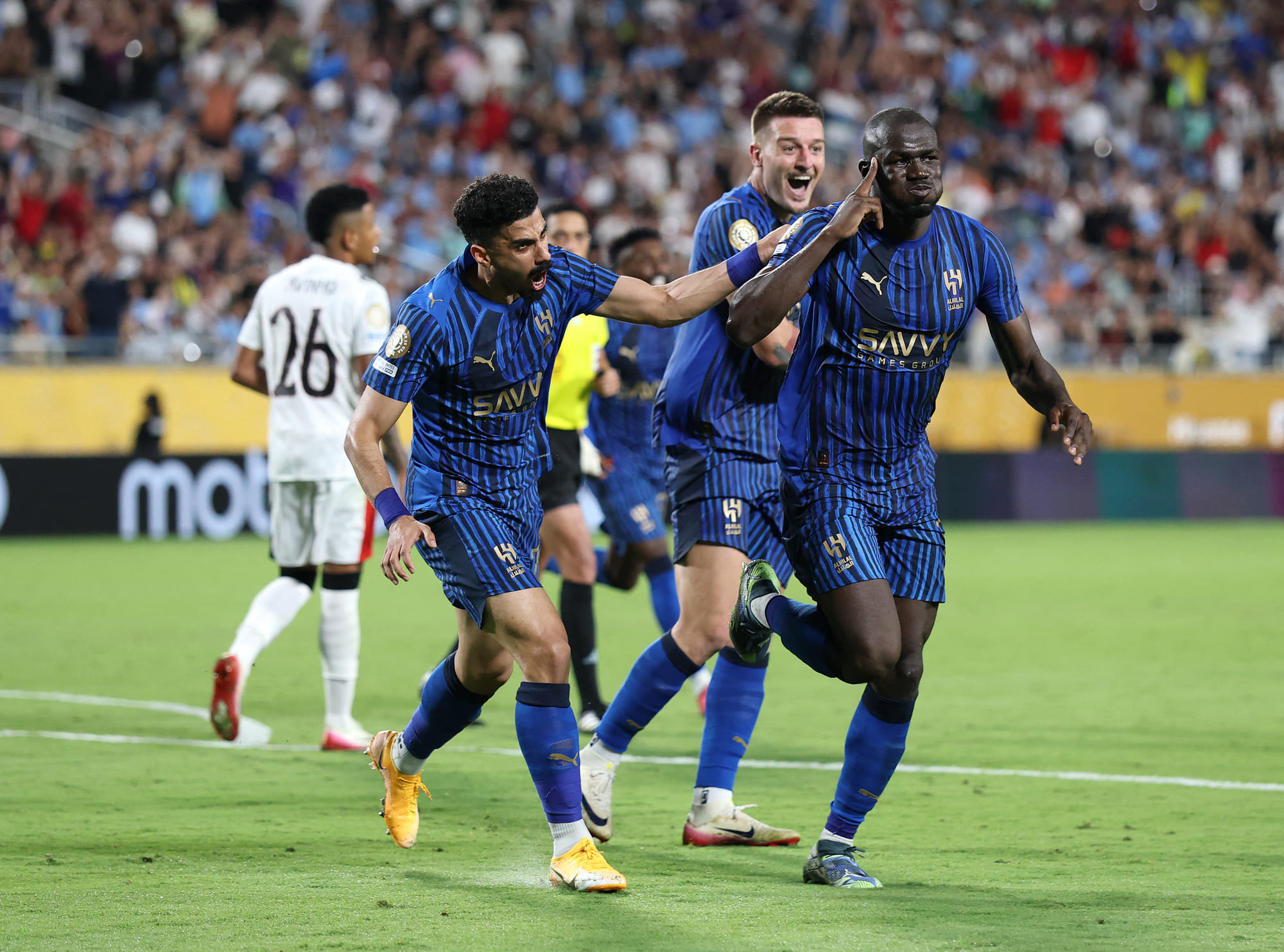 Kalidou Koulibaly of Al Hilal celebrates after scoring his team's third goal with Ali Lajami and Sergej Milinkovic-Savic during the Fifa Club World Cup 2025 round of 16 match against Manchester City in Orlando, Florida, on Sunday.
