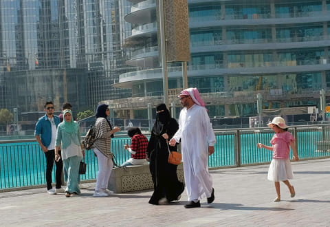 Despite the regional disruption, the UAE’s two largest aviation gateways — Dubai International Airport and Zayed International Airport — continue to operate a reduced but functioning schedule. Pictured above are Saudi and Arab tourists in Dubai for illustrative purposes. 