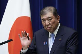 Japan's Prime Minister Shigeru Ishiba vows to stay on despite historic election defeat