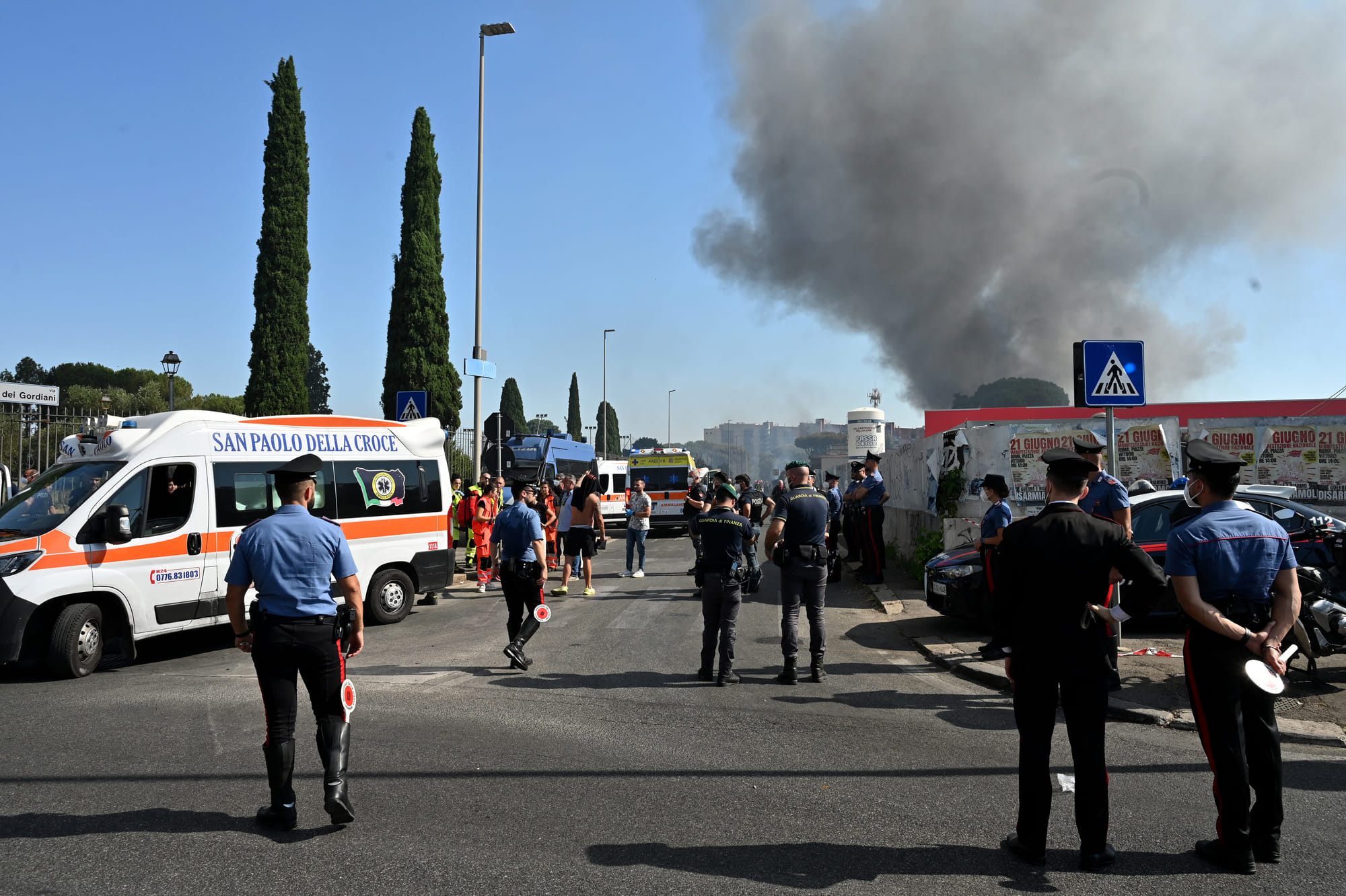 Firemen, policemen and rescue teams work on the site of an explosion in a fuel station in Rome on July 4, 2025.
