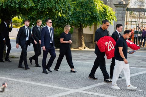 Liverpool players walk to attend the funeral of their teammate Diogo Jota and his brother André Silva in Gondomar, near Porto, Portugal, on Saturday.