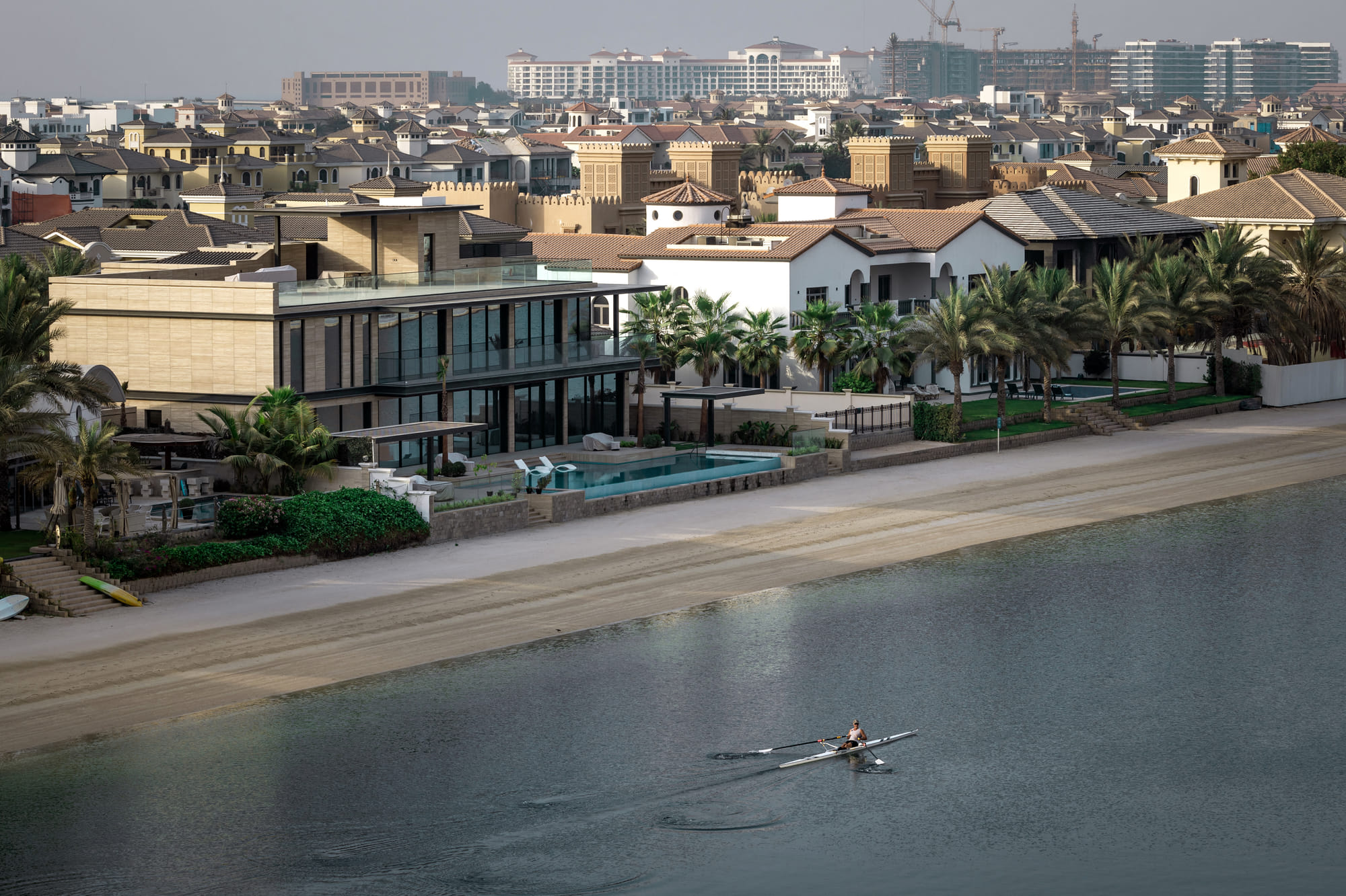 A picture shows beachfront villas in the Palm Jumeirah in the Gulf emirate of Dubai on July 8, 2025.