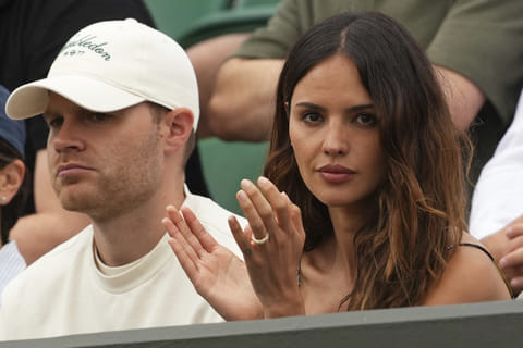 Eiza Gonzalez, the girlfriend of Grigor Dimitrov of Bulgaria watches as he plays Sebastian Ofner of Austria during a third round men's singles match at the Wimbledon Tennis Championships in London, Saturday, July 5, 2025.