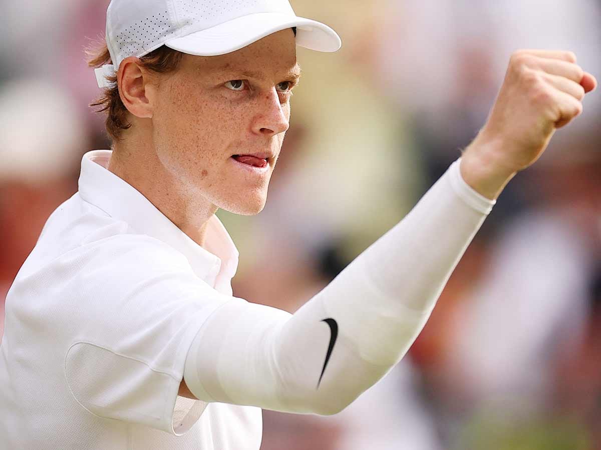 Italy's Jannik Sinner celebrates after winning against US player Ben Shelton during their men's singles quarter-final match of the 2025 Wimbledon Championships at The All England Lawn Tennis and Croquet Club in Wimbledon, southwest London, on July 9, 2025.