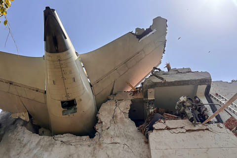 This handout photograph taken and posted on the X (formerly Twitter) account of the Central Industrial Security Force (CISF) on June 12, 2025 shows the tailpiece of Air India flight AI171 after it crashed in a residential area near the airport in Ahmedabad.