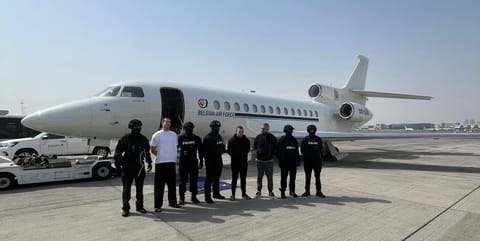 The suspects—Mathias Akyazili, Giorgi Faes, and Othman El Ballouti—were apprehended in Dubai based on Interpol red notices.