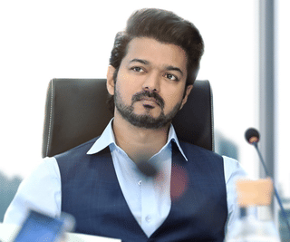 Actor Thalapathy Vijay trips and falls at airport while mobbed after Jana Nayagan audio launch
