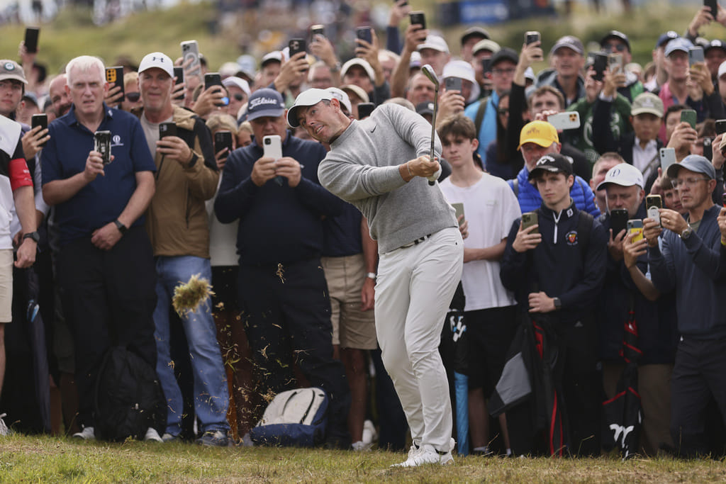 Rory McIlroy of Northern Ireland plays out of the rough on the 4th hole during the first round of the British Open golf championship at the Royal Portrush Golf Club, Northern Ireland, Thursday, July 17, 2025.