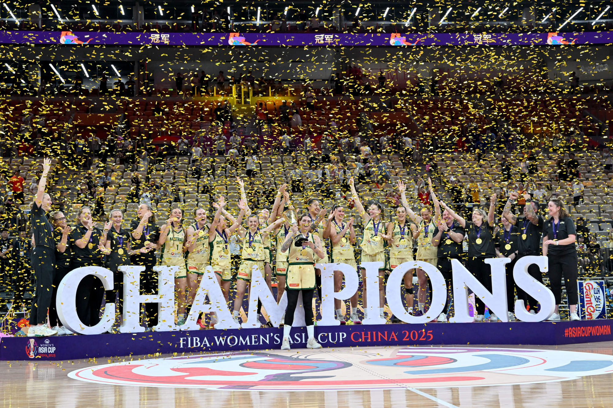 Australia's team celebrates with their trophy during an award ceremony at the 2025 FIBA Women’s Asia Cup basketball tournament in Shenzhen, China’s southern Guangdong province on July 20, 2025.