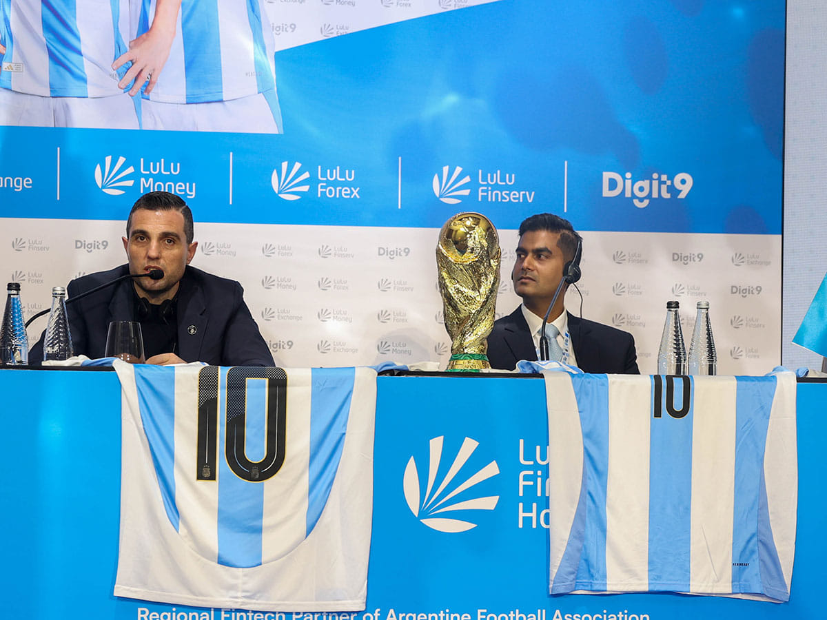 Leandro Petersen (left) and Mohamed Shanil, VP Lulu Money, addressing a press conference with the World Cup trophy in front in Dubai on Tuesday.