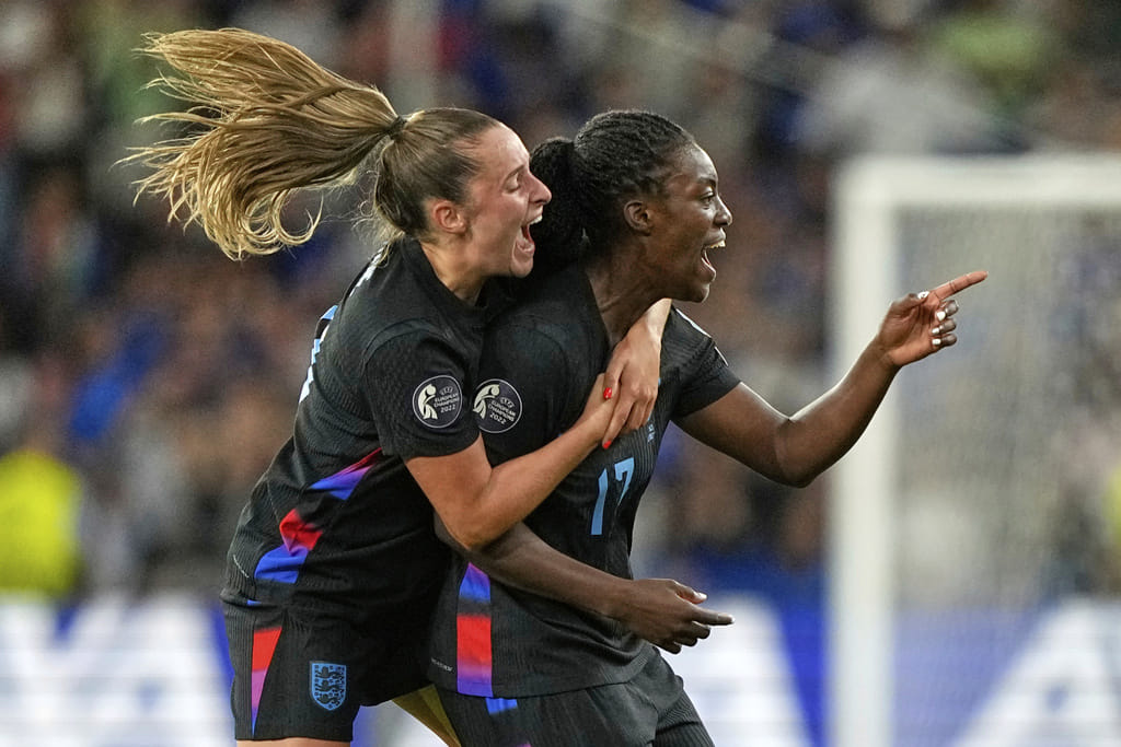 England's Michelle Agyemang, right, celebrates with Ella Toone after scoring her side's first goal during the Women's Euro 2025 semifinals soccer match between England and Italy at Stade de Geneve in Geneva, Switzerland, Tuesday, July 22, 2025.