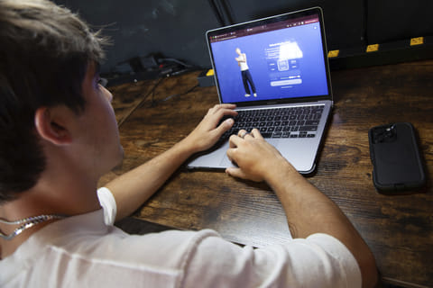 Bruce Perry, 17, demonstrates the possibilities of artificial intelligence by creating an AI companion on Character AI, Tuesday, July 15, 2025, in Russellville.  