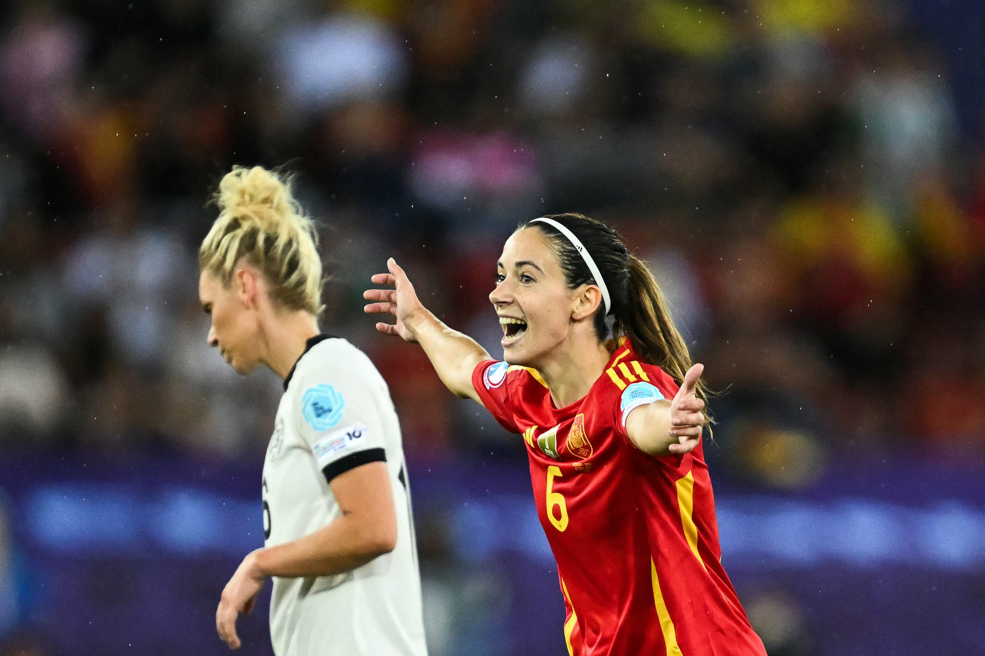 Spain's midfielder Aitana Bonmati (right) celebrates her team's victory at the end of the Uefa Women's Euro 2025 semi-final football match against Germany at the Letzigrund Stadium in Zurich, on July 23, 2025.