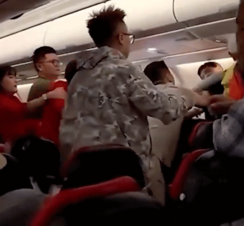 The trouble reportedly began after a male passenger confronted a group of women onboard for “talking loudly” after cabin lights were dimmed.