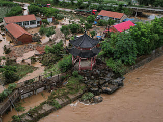 Four killed in landslide as heavy rain drenches northern China
