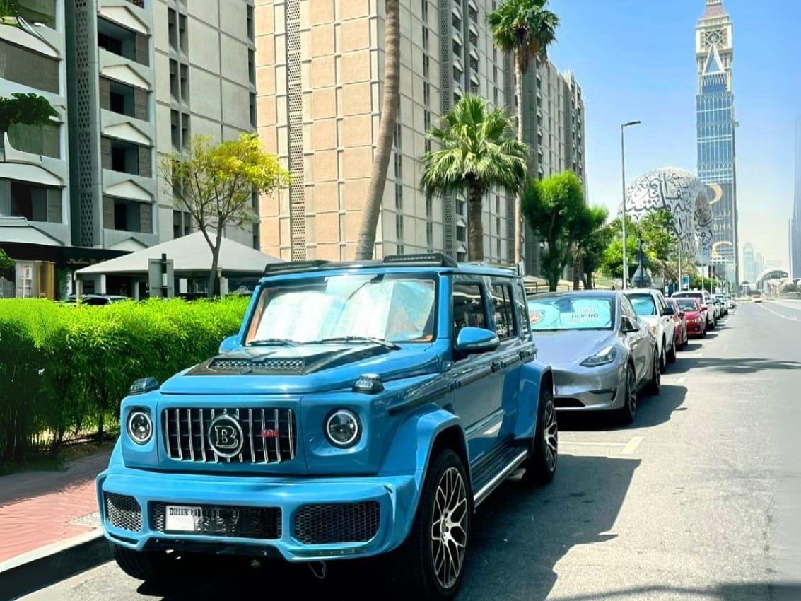 It's a head-turning 4WD monster with a Brabus kit, wrapped in a rare bluish finish and bold orange leather inside.