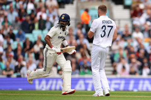 India's KL Rahul runs past England's Gus Atkinson on the first day of the fifth Test cricket match between England and India at The Oval in London on July 31, 2025.
