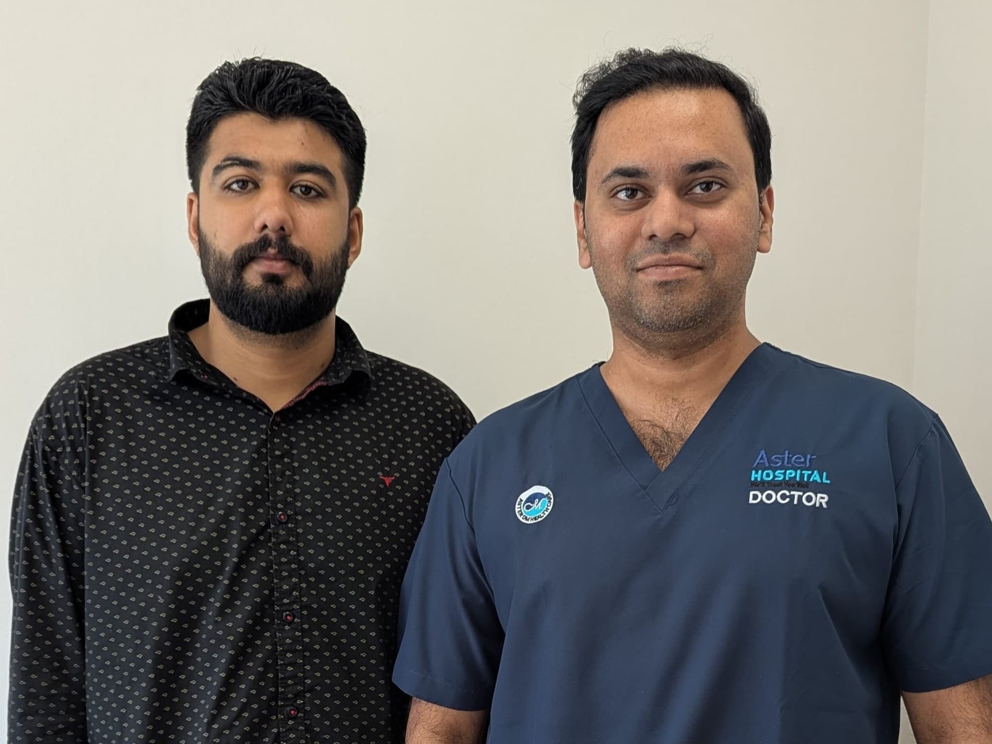 Muhammad Bilal with Dr Roshan Rodney S at Aster Hospital Mankhool after successful treatment.