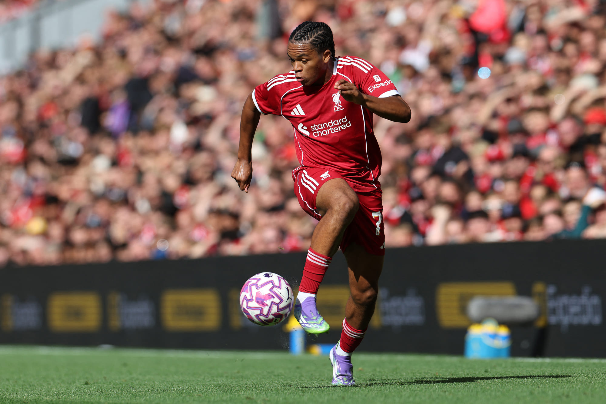Liverpool's English strikerRio Ngumoha controls the ball during the first of two pre season friendly football matches against Athletic Bilbao at Anfield in Liverpool, north west England on August 4, 2025.