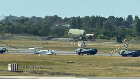 Photos on social media show a small propeller plane on the runway,