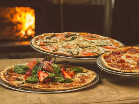 From Italian woodfired pizzas to sky-high infinity brunches, explore this month’s top dining spots in Dubai and Abu Dhabi.