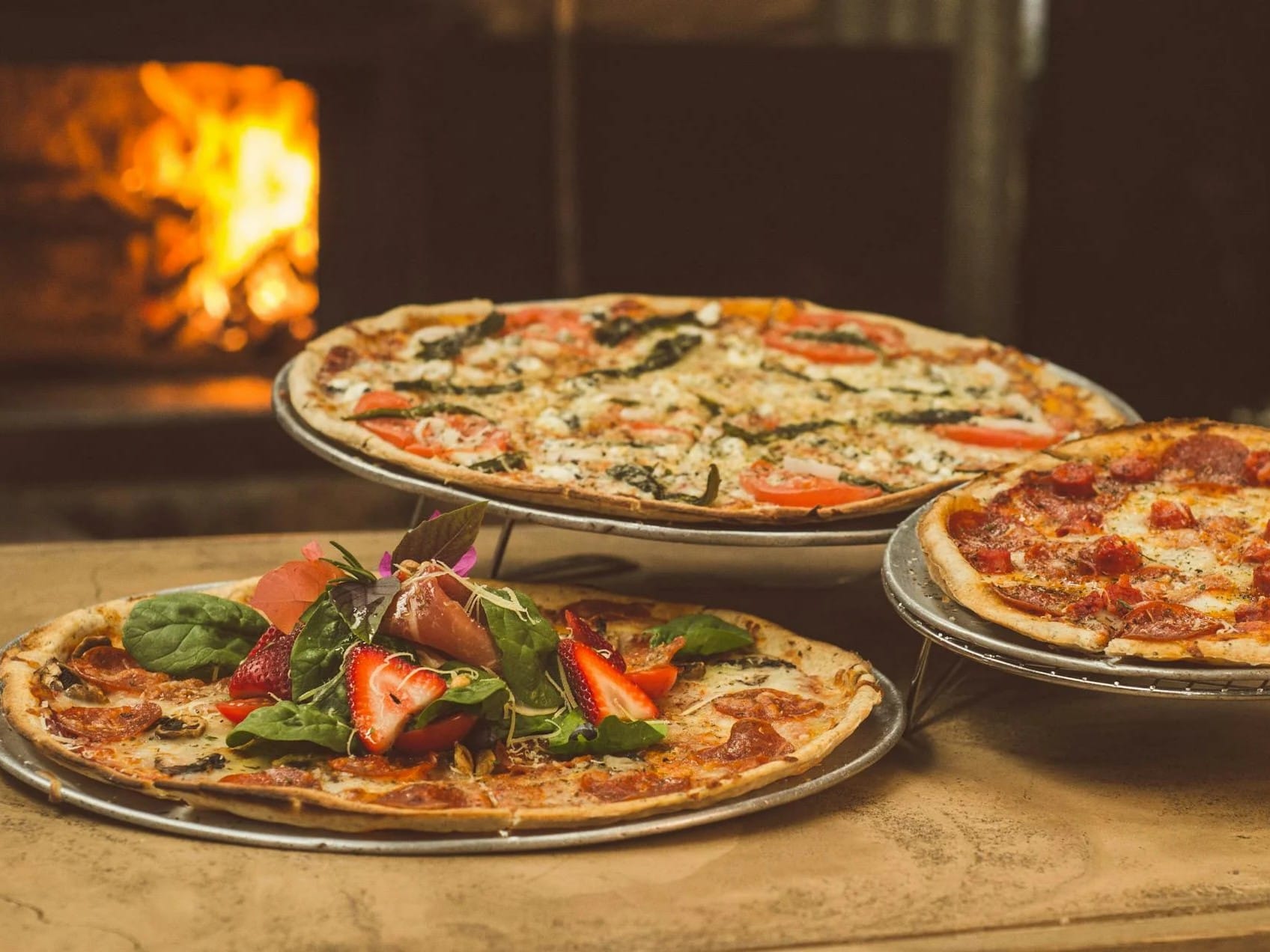 From Italian woodfired pizzas to sky-high infinity brunches, explore this month’s top dining spots in Dubai and Abu Dhabi.