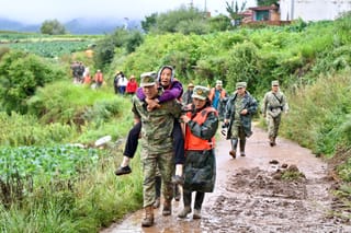 Death toll from northwest China floods rises to 13