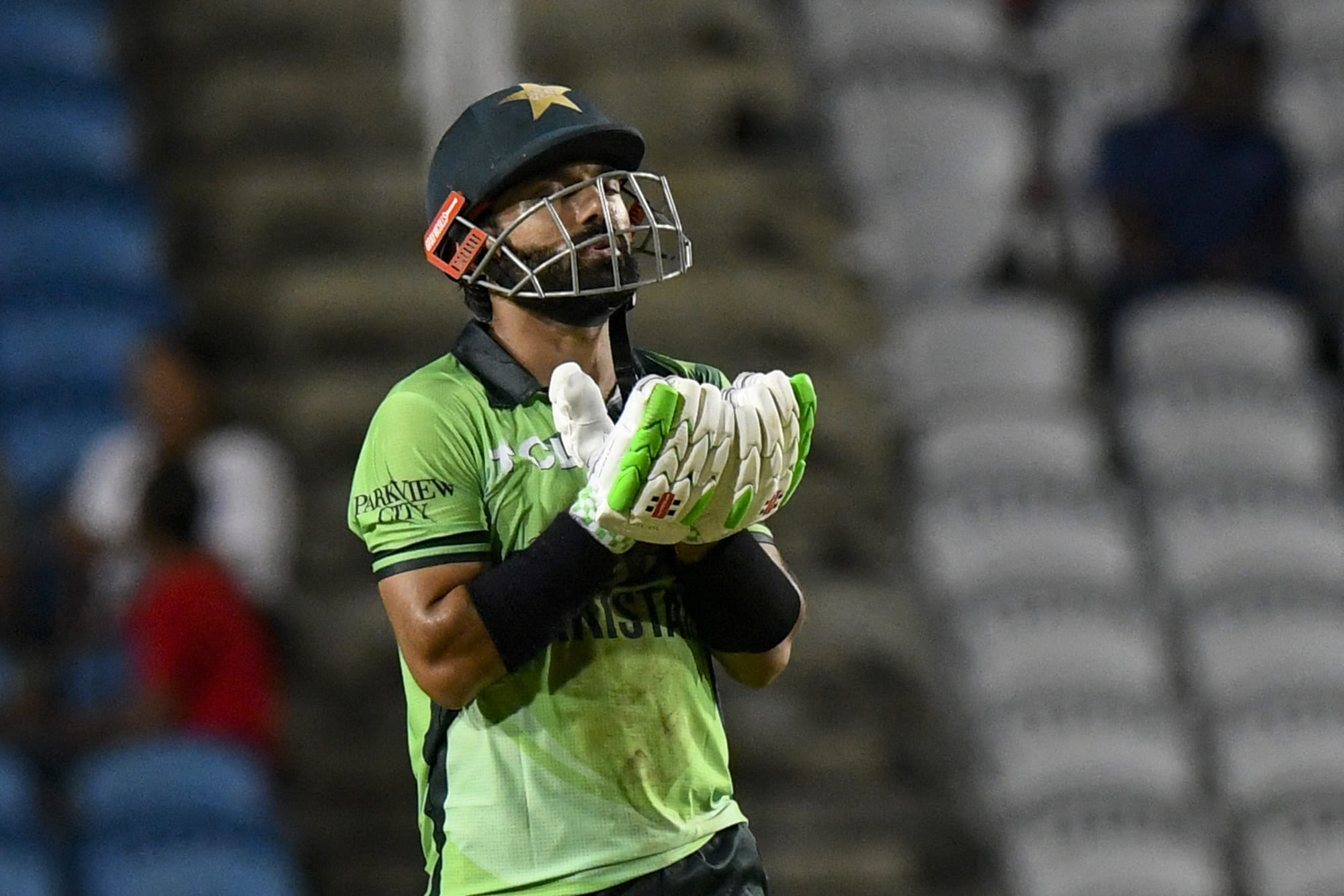 Mohammad Rizwan of Pakistan celebrates his half century during the first One Day International (ODI) cricket match between West Indies and Pakistan at Brian Lara Cricket Academy in Tarouba, San Fernando, Trinidad and Tobago on August 8, 2025.