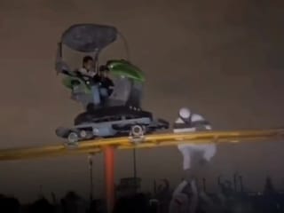 Saudi Father climbs stalled ride to rescue children amid power outage