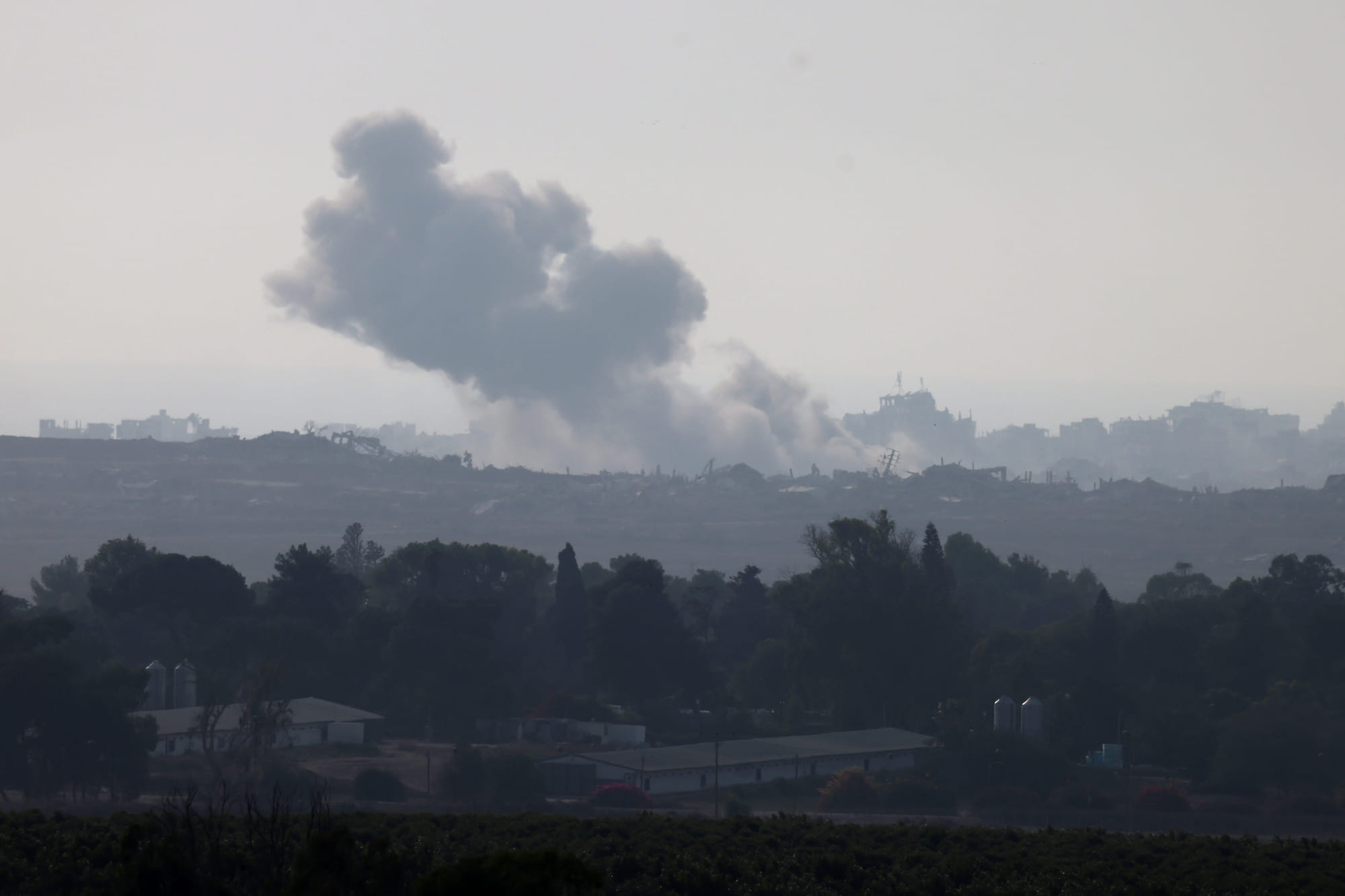 This picture taken from a position on the Israeli border with the Gaza Strip, shows smoke rising during an Israeli strike on the besieged Palestinian territory on August 10, 2025.
