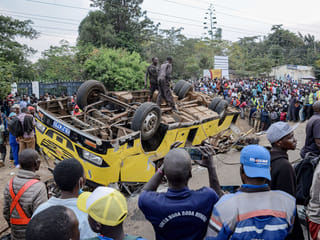 A bus carrying mourners from a funeral overturns in Kenya, killing 25 people