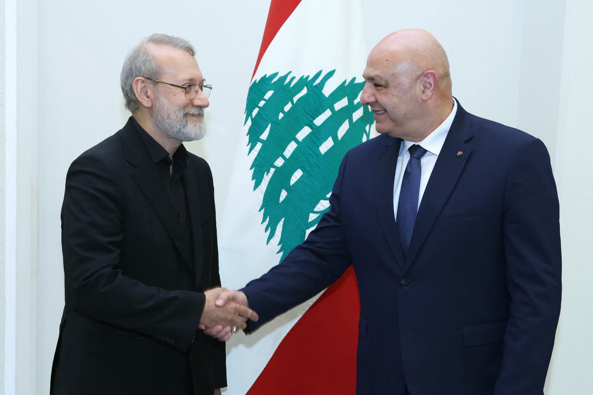 Lebanon's President Joseph Aoun (right) meets with Iran's head of the National Security Council Ali Larijani and a delegation at the Presidential Palace in Baabda on August 13, 2025.
