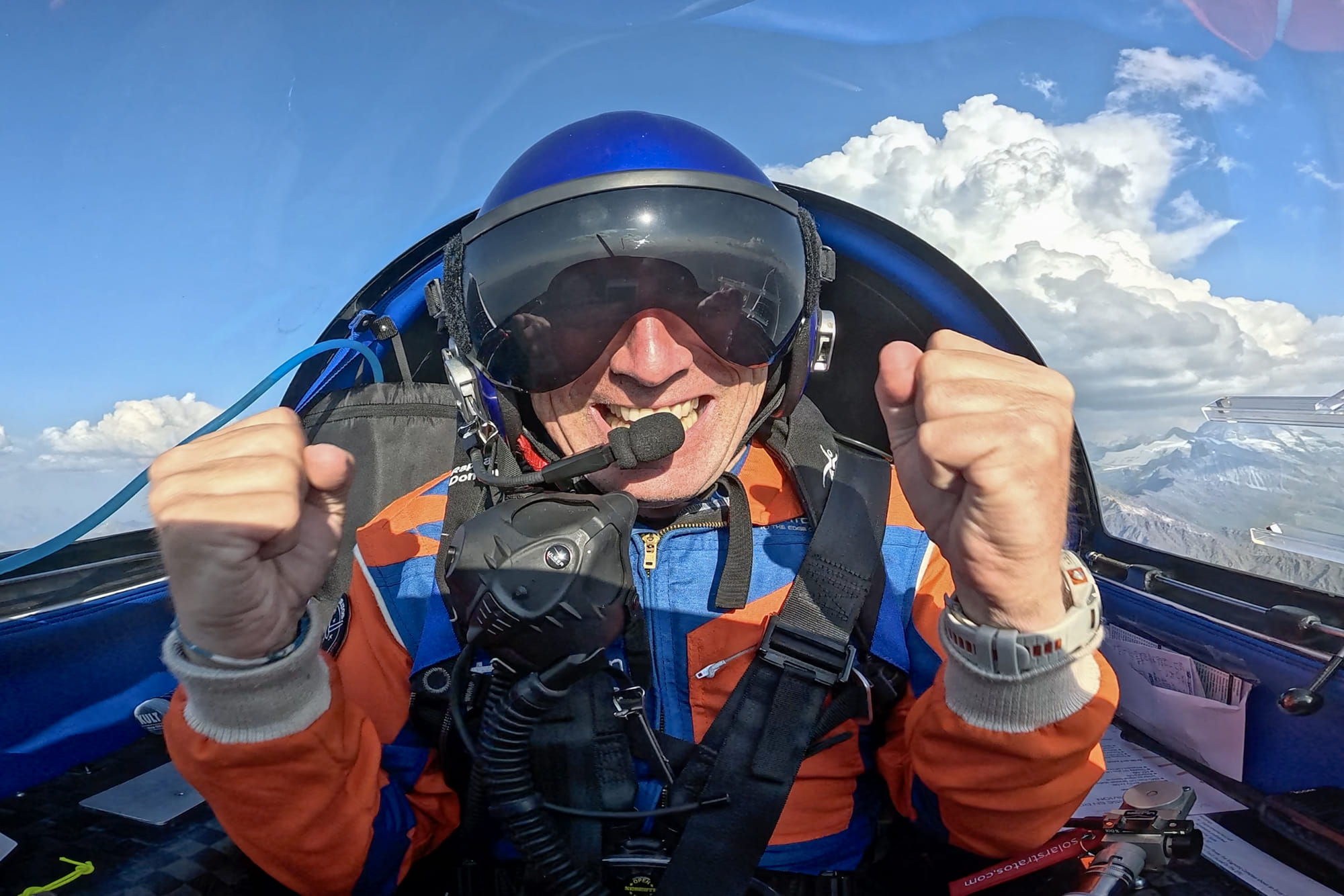 This handout picture taken on August 12, 2025 by Swiss pilot Raphael Domjan and made available on August 13, 2025 shows him reacting after receiving the news that he beat the altitude record for a solar-powered electric plane.