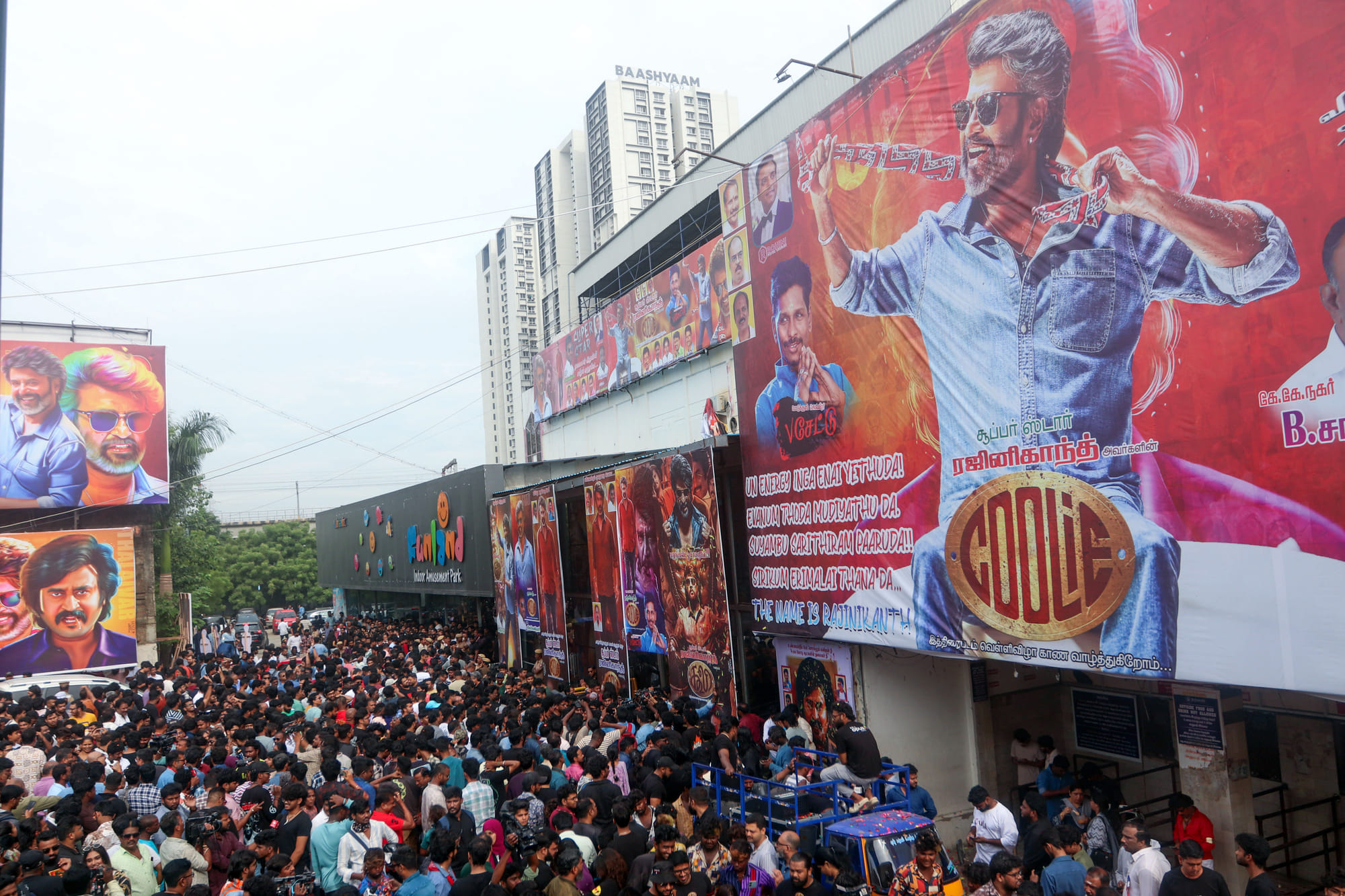  Fans bust firecrackers outside a movie theatre as they celebrate the release of 'Superstar' Rajnikanth's film 'Coolie', in Chennai on Thursday.