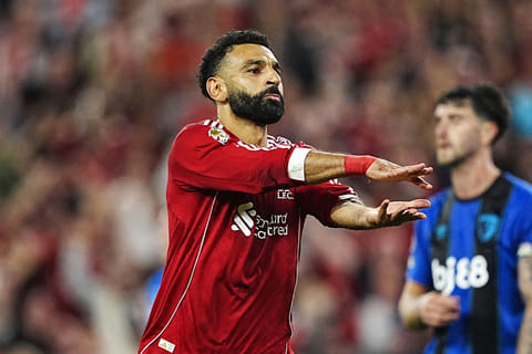 Liverpool's Mohamed Salah pays a tribute to Diogo Jota after scoring his side's fourth goal in the Premier League opener against Bournemouth at Anfield on Friday.