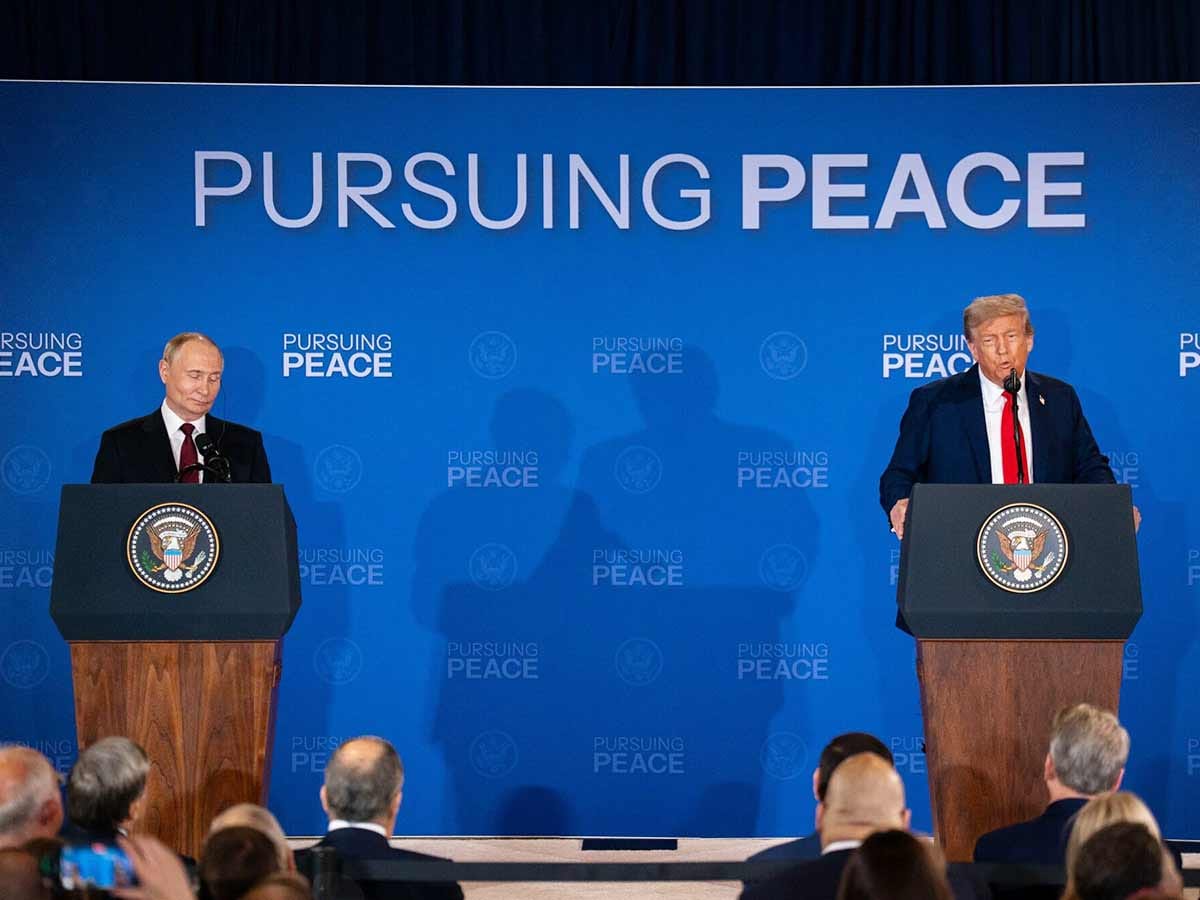 Vladimir Putin, Russia's president, left, and US President Donald Trump during a joint news conference at Joint Base Elmendorf-Richardson in Anchorage, Alaska, US, on Friday, August 15, 2025.