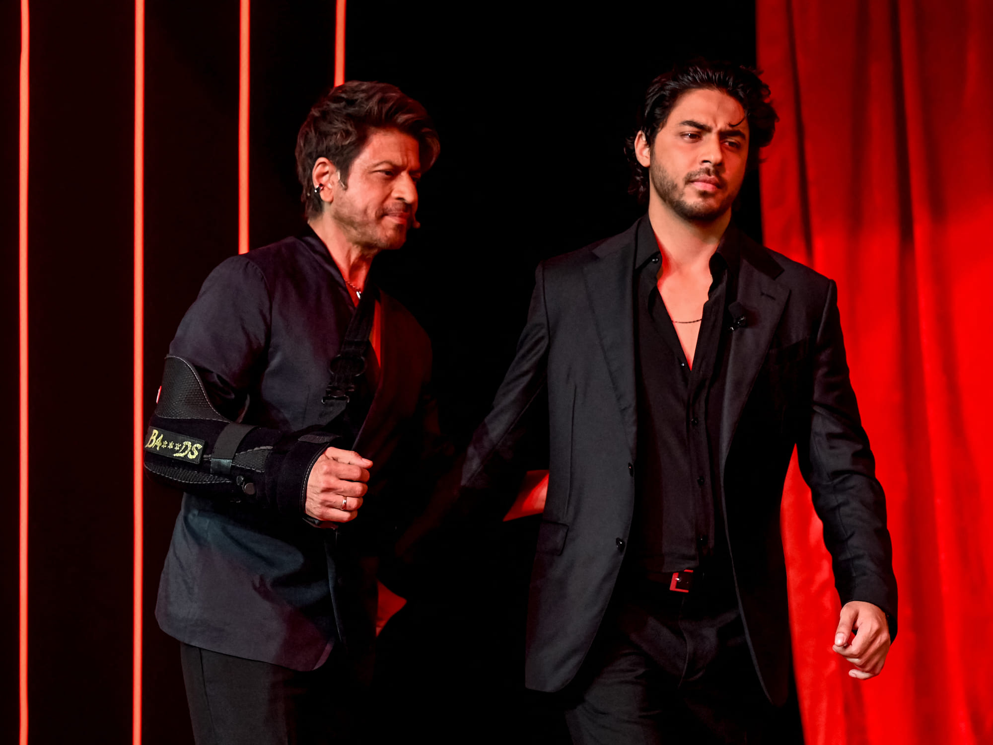 Bollywood actor Shah Rukh Khan (L) and his son Aryan Khan in August