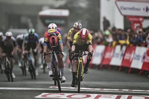 Team Visma-Lease a bike's Danish rider Jonas Vingegaard (R) crosses the finish line to win ahead of Team Lidl-Trek's Italian rider Giulio Ciccone (L) during the second stage of the Vuelta a Espana, a 159,6 km race between Alba and Limone Piemonte, in Italy's Piemonte region, on August 24, 2025.