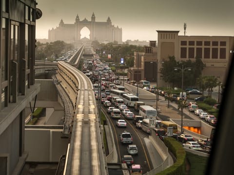 A picture taken from a station of Dubai's Palm Monorail, shows traffic on a road in Palm Jumeirah on August 28, 2025.
