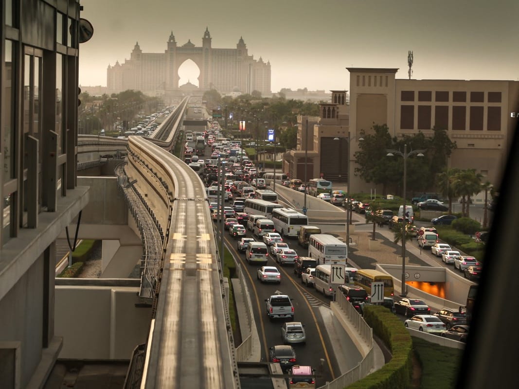 A picture taken from a station of Dubai's Palm Monorail, shows traffic on a road in Palm Jumeirah on August 28, 2025.