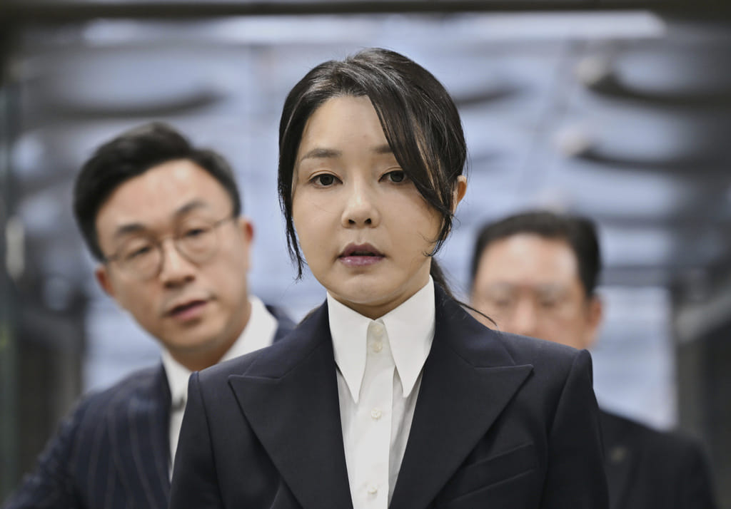 FILE - South Korea's former first lady Kim Keon Hee, wife of impeached former president Yoon Suk Yeol, arrives at a court to attend a hearing to review her arrest warrant requested by special prosecutors, in Seoul, South Korea, on Aug. 12, 2025. 