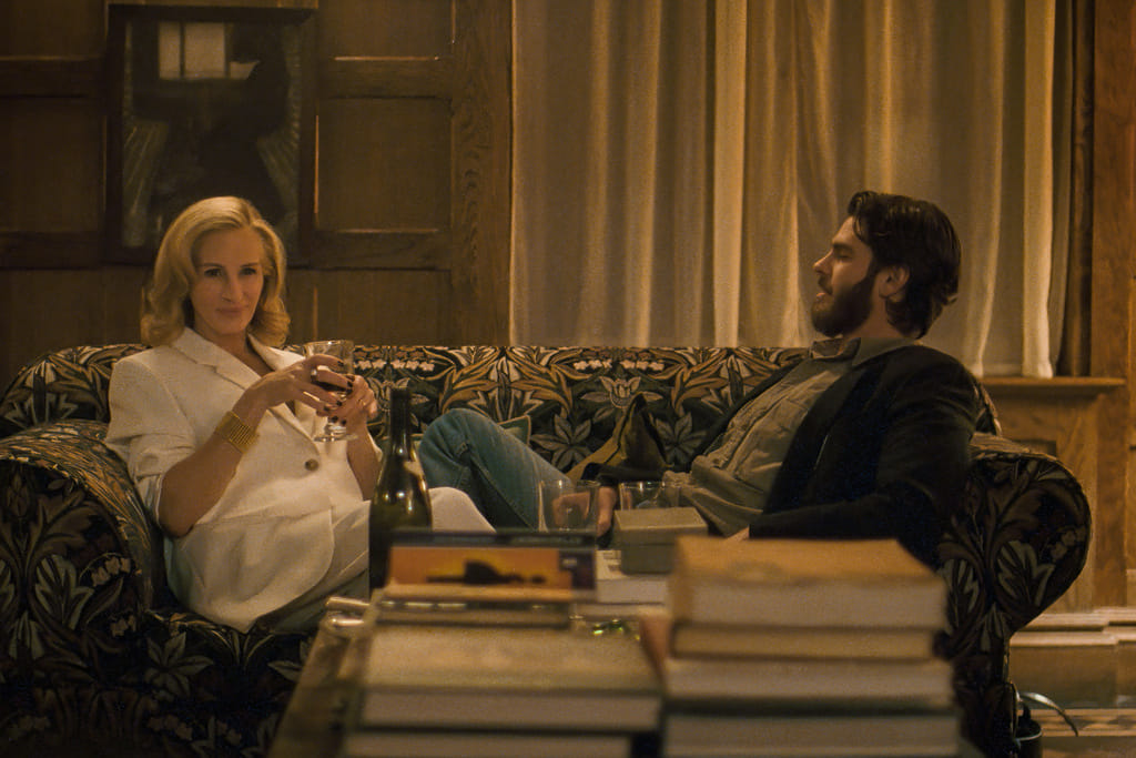 This image released by Amazon MGM Studios shows Julia Roberts, left, and Andrew Garfield in a scene from "After the Hunt." (Amazon MGM Studios via AP)