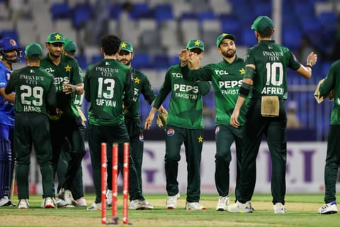 Pakistan players celebrate their comfortable win against Afghanistan in the tri-series opener at Sharjah Stadium on Friday.
