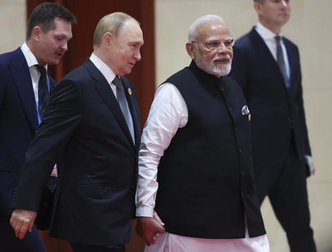 Russian President Vladimir Putin and Indian Prime Minister Narendra Modi on their way to attend the Shanghai Cooperation Organization (SCO) summit in Tianjin, China , on September 1, 2025.  