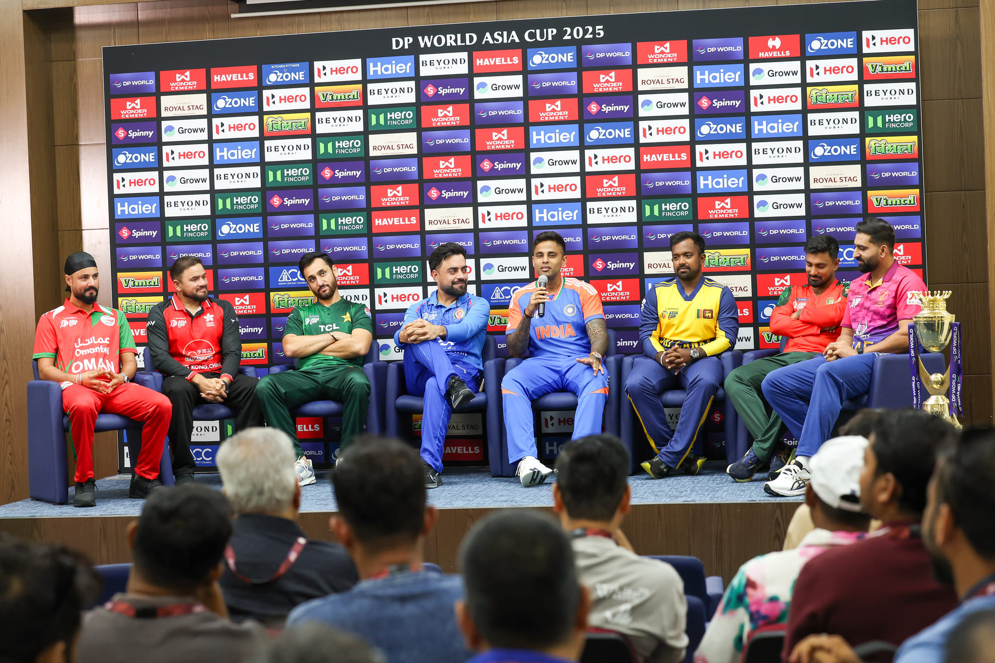 (From right) Captains Muhammad Waseem (UAE), Litton Das (Bangladesh ), Charith Asalanka (Sri Lanka), Surya Kumar Yadav (India ), Rashid Khan (Afghanistan), , Salman Ali Agha (Pakistan ), Yasim Murtaza (Hong Kong) and Jatinder Singh (Oman) during the Asia Cup press conference.