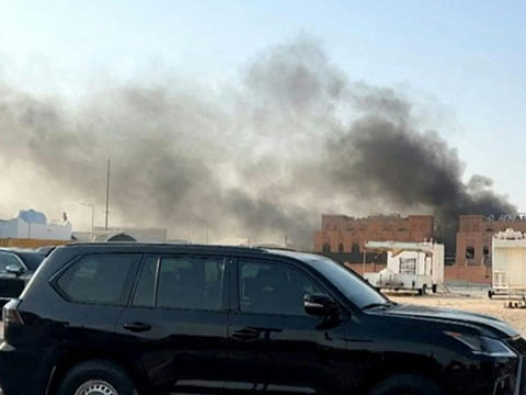 This frame grab taken from an AFPTV footage shows smoke billowing after explosions in Doha's capital Qatar on September 9, 2025. 